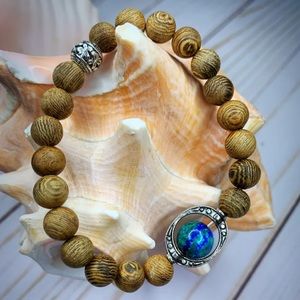 Tibetan teak wood bracelet with a single Lapis Lazuli stone by Soul in Stone